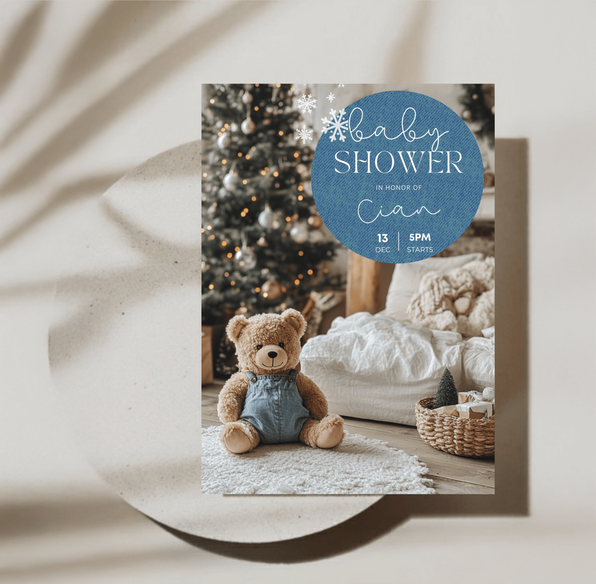 Editable denim & merry baby shower invitation with teddy bear and Christmas tree lights, cozy winter neutral décor.